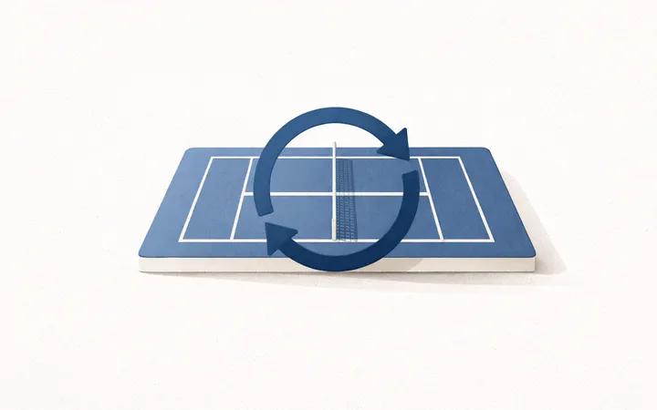 a tennis court with a rotating symbol